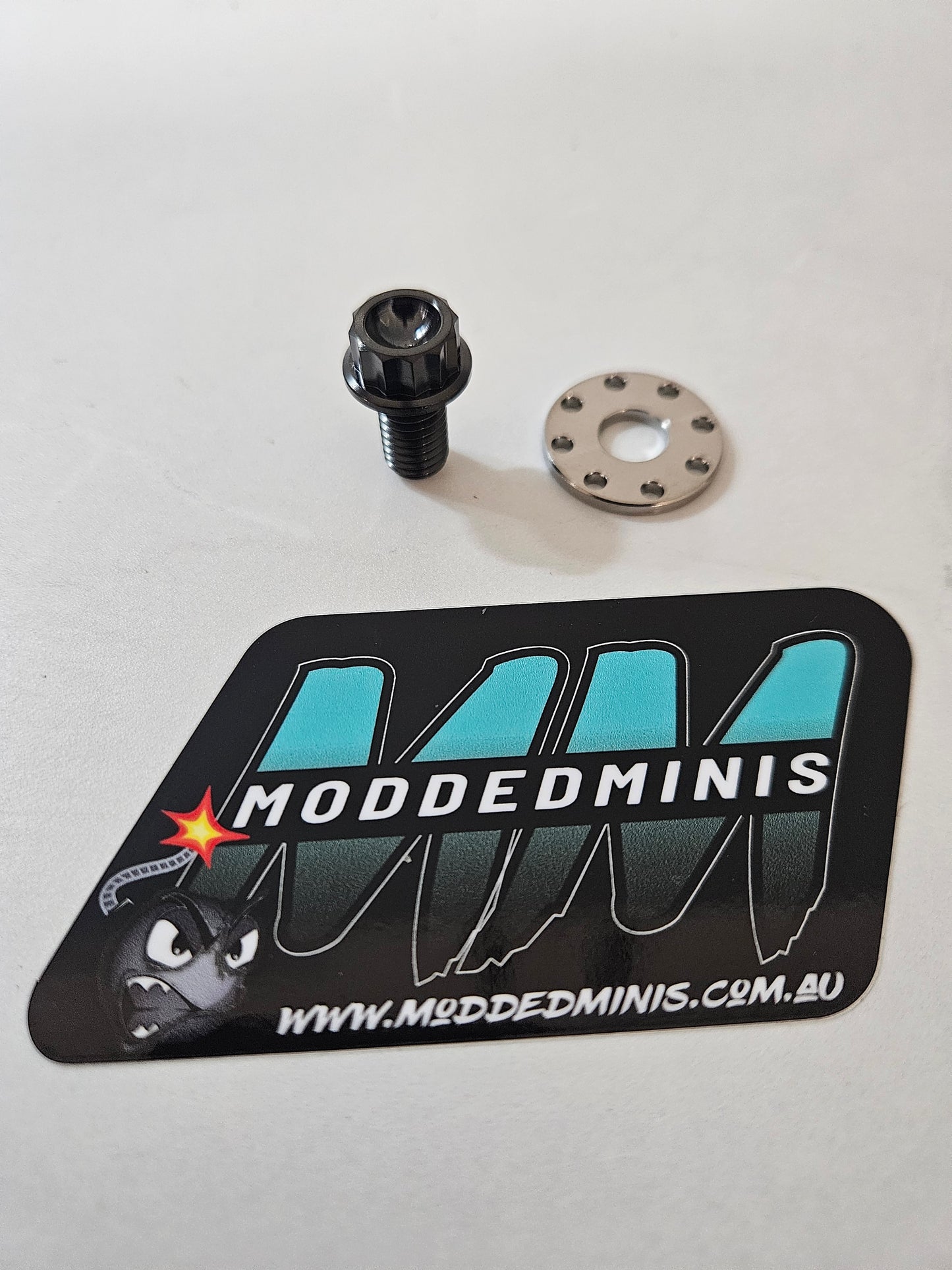 Titanium fuel tank cover bolt and drill spec washer